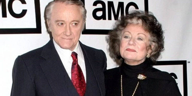 Barbara Joyce Rupard, often known as the devoted wife of country music legend Roy Clark, forged her own significant, albeit private, legacy. While her life was deeply intertwined with the dazzling world of entertainment through her husband’s career, Barbara was far more than just a supportive partner. Her journey was marked by quiet grace, unwavering resilience, and a steadfast commitment to her family. She embodied a quiet strength that often goes unnoticed in the glare of celebrity. This article aims to explore the life of Barbara Joyce Rupard, delving into her early years, her enduring partnership with Roy Clark, her vital role as a mother, and the personal identity she maintained amidst public attention. By examining these facets of her life, we can gain a deeper appreciation for the woman behind the public figure. We’ll understand the profound impact she had on those around her and the quiet contributions she made to her family and community. Early Life and Background Born on January 31, 1935, in the United States, Barbara Joyce Rupard entered a world that would eventually connect her to one of country music’s most beloved figures. Details about her early childhood and upbringing remain largely private, reflecting a life lived away from the public eye before her marriage to Roy Clark. It’s understood that she grew up in a loving family environment. This likely instilled in her the values of family and privacy that she cherished throughout her life. While specific anecdotes from her formative years aren’t widely publicized, her later life with Roy Clark suggests a woman of considerable character and inner strength. These early experiences, though unrecorded in public narratives, undoubtedly shaped the individual she became—a steadfast partner and a devoted mother. Life with Roy Clark: A Partnership in Music and Life Barbara Joyce Rupard’s life took a significant turn when she met and married the charismatic country music star, Roy Clark. Their union, which began on August 31, 1957, was a testament to enduring love and partnership. It lasted for 61 years until Roy Clark’s passing in 2018. This long and stable marriage was a rarity in the often-turbulent world of entertainment, speaking volumes about the strength of their bond. Throughout Roy Clark’s illustrious career, Barbara was his unwavering support system. While she largely remained out of the spotlight, her presence was a constant source of stability for the busy musician. She managed their home and family life, allowing Roy to focus on his demanding schedule of performances, recordings, and television appearances. Their relationship was built on mutual respect and understanding. Barbara provided the grounding influence that allowed Roy to thrive professionally. Family Life and Children Together, Barbara Joyce Rupard and Roy Clark built a loving family, raising five children. Despite the demands of Roy Clark’s career, Barbara ensured a stable and nurturing environment for their children. She was a dedicated mother, prioritizing their well-being and education. She instilled in them the values of hard work and integrity. Her role as a mother was central to her identity. She navigated the challenges of raising a family while her husband was often on the road, demonstrating remarkable strength and adaptability. The success and well-being of their children stand as a testament to her unwavering commitment and the strong foundation she provided for their family. Her Own Identity and Contributions While often defined by her marriage to Roy Clark, Barbara Joyce Rupard maintained a distinct identity. She was known for her grace, autonomy, and a steadfast commitment to privacy. Unlike many spouses of celebrities who embrace the public eye, Barbara chose a more private existence, focusing on her family and personal life. Her contributions, though not always visible to the public, were significant. She was the anchor of the Clark family, providing emotional support and a stable home environment. Her quiet strength and unwavering dedication allowed Roy Clark to pursue his passion, knowing he had a strong foundation at home. This behind-the-scenes support is invaluable and often overlooked, yet it is crucial for the success and well-being of public figures. Later Years and Legacy In her later years, Barbara Joyce Rupard continued to live a life of quiet dignity. Even after Roy Clark’s passing in 2018, she remained a private figure, cherishing the memories of their long and loving marriage. Her legacy isn’t one of public accolades or grand achievements. Instead, it’s one of unwavering devotion, quiet strength, and the profound impact she had on her family. She represents the often-unsung heroes behind successful public figures. These are individuals who provide the essential support, stability, and love that enable their partners to shine. Barbara Joyce Rupard’s life serves as a reminder that true strength and influence can often be found in the quiet dedication to family and personal values. Conclusion Barbara Joyce Rupard’s life, though largely lived away from the glare of public attention, was a testament to enduring love, unwavering support, and quiet strength. As the wife of country music icon Roy Clark, she played an indispensable role in his life and career, providing the stability and love that allowed him to flourish. Beyond her role as a famous spouse, she was a devoted mother and a woman of grace and autonomy. Her story reminds us that true impact often extends beyond public recognition, residing in the profound connections and steadfast dedication within families. Barbara Joyce Rupard’s legacy is etched not in headlines, but in the hearts of those who knew and loved her. It’s a quiet yet powerful testament to a life well-lived.